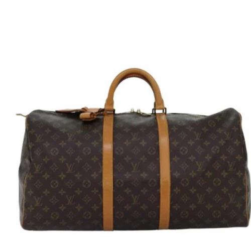 Pre-owned Canvas travel-bags Louis Vuitton Vintage , Brown , Dames