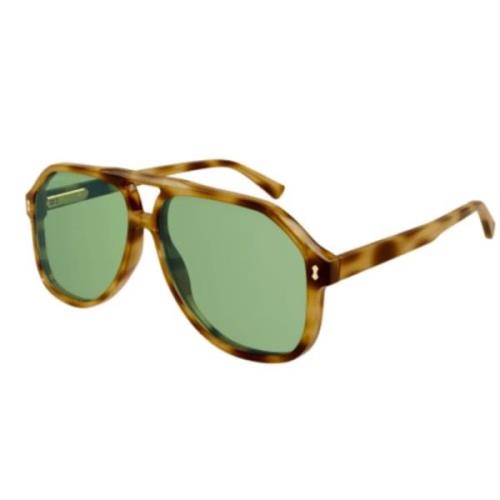 Stijlvolle zonnebril voor modefanaten Gucci , Brown , Unisex