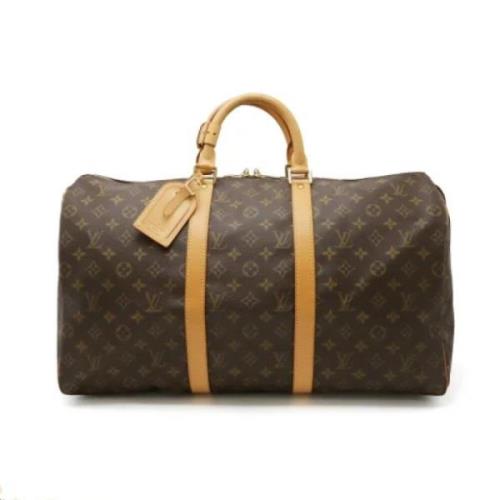 Pre-owned Canvas travel-bags Louis Vuitton Vintage , Brown , Dames