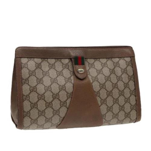 Pre-owned Leather clutches Gucci Vintage , Beige , Dames