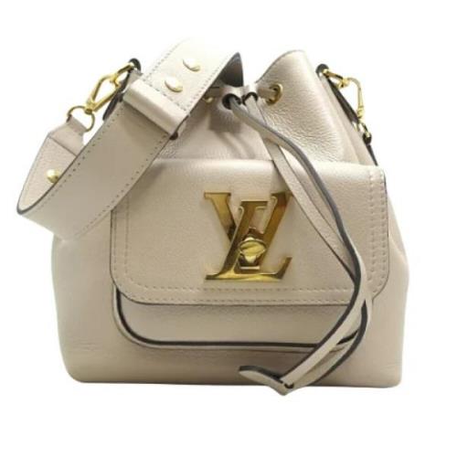 Pre-owned Leather shoulder-bags Louis Vuitton Vintage , Beige , Dames