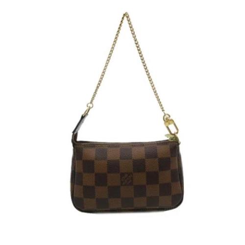 Pre-owned Canvas clutches Louis Vuitton Vintage , Brown , Dames