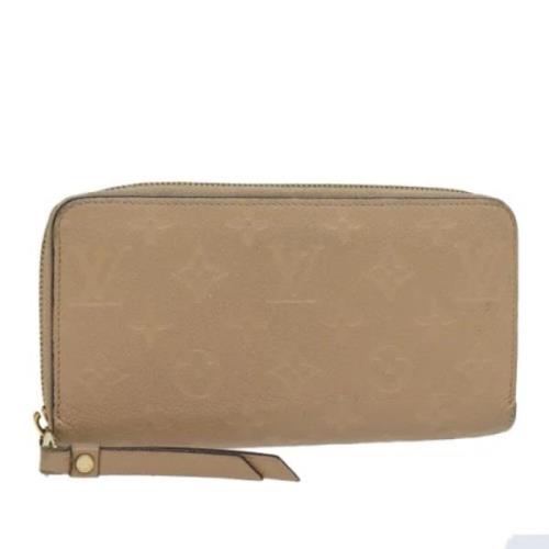 Pre-owned Leather wallets Louis Vuitton Vintage , Beige , Dames