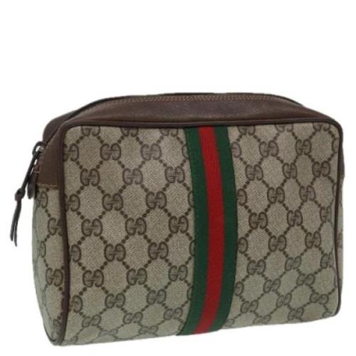 Pre-owned Leather clutches Gucci Vintage , Beige , Dames