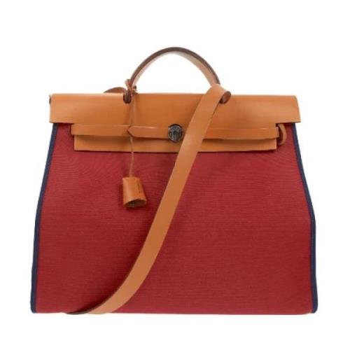 Pre-owned Leather handbags Hermès Vintage , Red , Dames