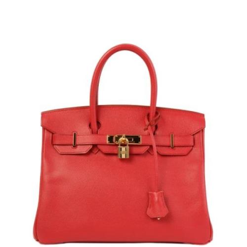 Pre-owned Canvas handbags Hermès Vintage , Red , Dames