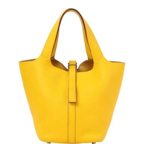 Pre-owned Canvas handbags Hermès Vintage , Yellow , Dames