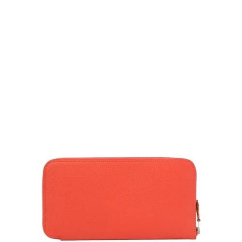 Pre-owned Canvas clutches Hermès Vintage , Orange , Dames