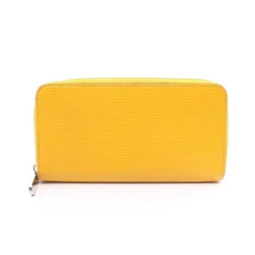 Pre-owned Leather wallets Louis Vuitton Vintage , Yellow , Dames