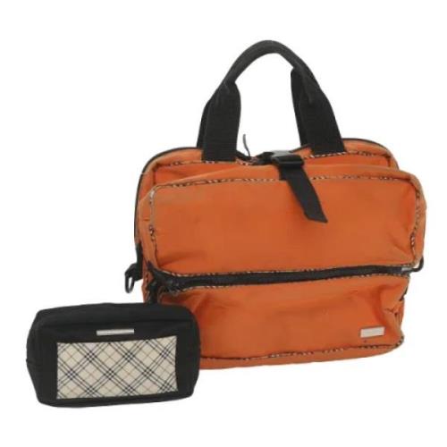 Pre-owned Nylon handbags Burberry Vintage , Orange , Dames