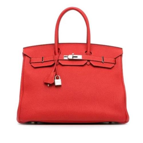 Pre-owned Leather handbags Hermès Vintage , Red , Dames