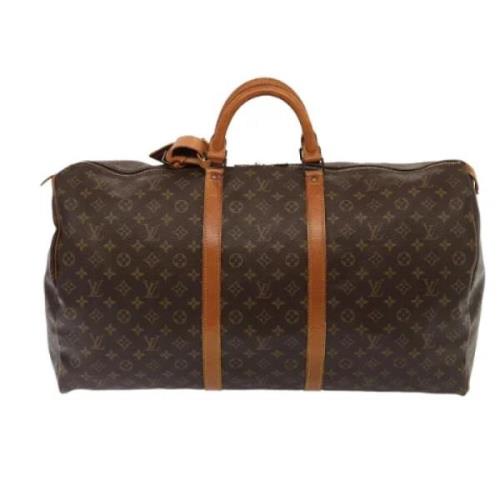 Pre-owned Canvas travel-bags Louis Vuitton Vintage , Brown , Dames