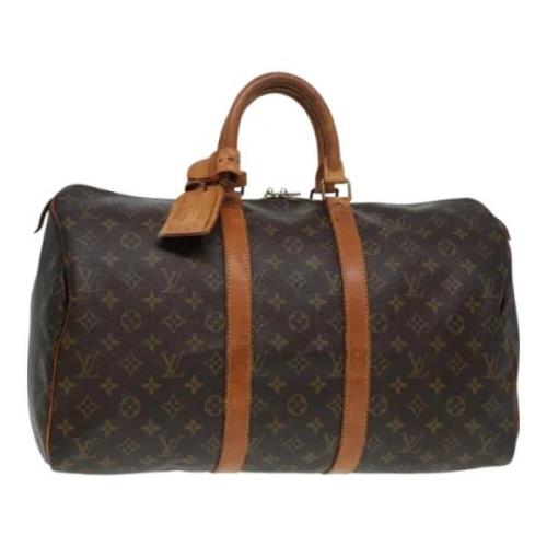 Pre-owned Canvas travel-bags Louis Vuitton Vintage , Brown , Dames