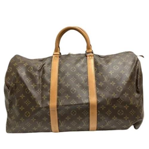 Pre-owned Canvas travel-bags Louis Vuitton Vintage , Brown , Dames