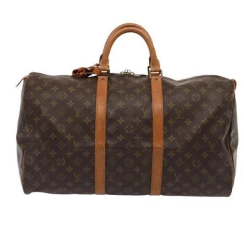 Pre-owned Canvas travel-bags Louis Vuitton Vintage , Brown , Dames