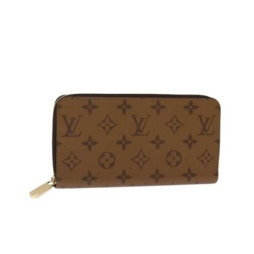 Pre-owned Canvas wallets Louis Vuitton Vintage , Brown , Dames