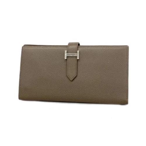 Pre-owned Leather wallets Hermès Vintage , Beige , Dames