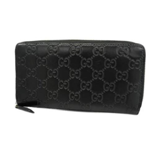 Pre-owned Leather wallets Gucci Vintage , Black , Dames