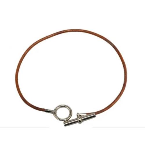 Pre-owned Metal necklaces Hermès Vintage , Brown , Dames