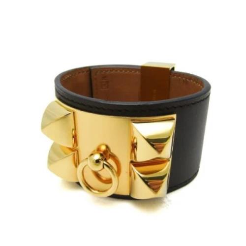 Pre-owned Metal bracelets Hermès Vintage , Yellow , Dames