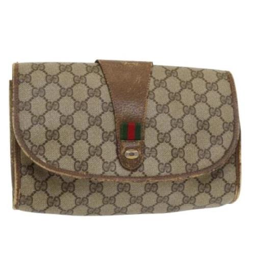 Pre-owned Leather clutches Gucci Vintage , Beige , Dames