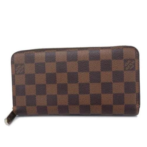 Pre-owned Fabric wallets Louis Vuitton Vintage , Brown , Dames