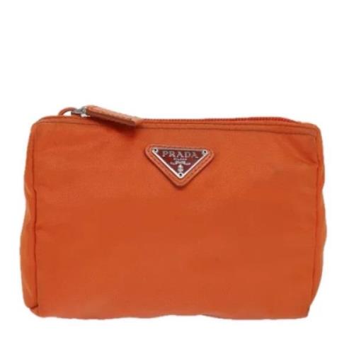 Pre-owned Fabric clutches Prada Vintage , Orange , Dames