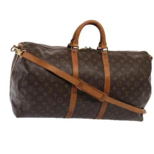 Pre-owned Canvas travel-bags Louis Vuitton Vintage , Brown , Dames