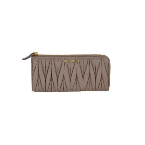 Pre-owned Leather clutches Miu Miu Pre-owned , Beige , Dames