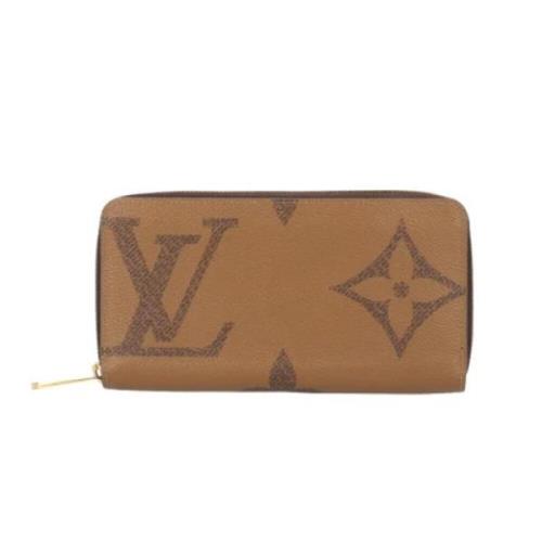 Pre-owned Fabric wallets Louis Vuitton Vintage , Brown , Dames