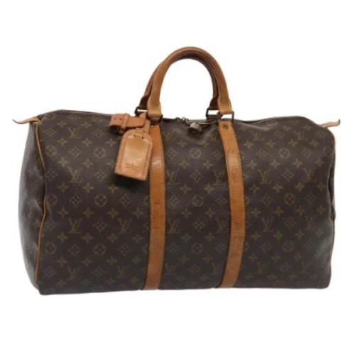 Pre-owned Canvas travel-bags Louis Vuitton Vintage , Brown , Dames