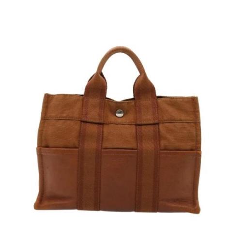 Pre-owned Canvas handbags Hermès Vintage , Brown , Dames