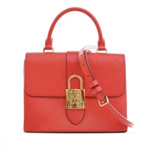 Pre-owned Leather handbags Louis Vuitton Vintage , Red , Dames