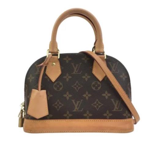 Pre-owned Canvas handbags Louis Vuitton Vintage , Brown , Dames