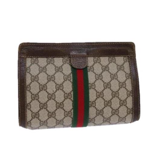 Pre-owned Leather clutches Gucci Vintage , Beige , Dames