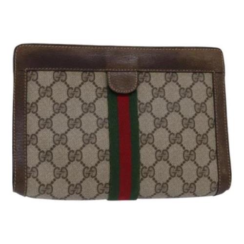 Pre-owned Leather clutches Gucci Vintage , Beige , Dames