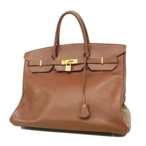 Pre-owned Leather handbags Hermès Vintage , Brown , Heren