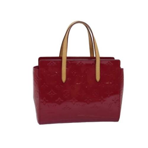 Pre-owned Leather handbags Louis Vuitton Vintage , Red , Dames