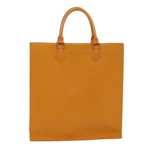 Pre-owned Leather handbags Louis Vuitton Vintage , Orange , Dames