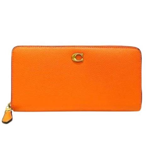 Pre-owned Leather wallets Coach Pre-owned , Orange , Dames