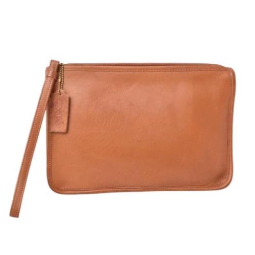 Pre-owned Leather clutches Coach Pre-owned , Brown , Dames