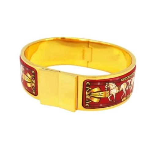 Pre-owned Metal bracelets Hermès Vintage , Yellow , Dames