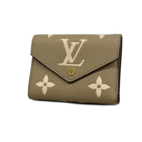 Pre-owned Fabric wallets Louis Vuitton Vintage , Beige , Dames