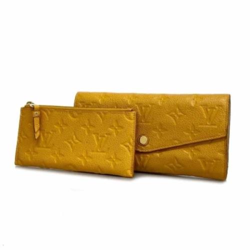 Pre-owned Fabric wallets Louis Vuitton Vintage , Yellow , Dames