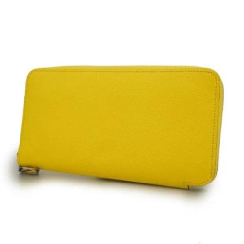 Pre-owned Leather wallets Hermès Vintage , Yellow , Dames