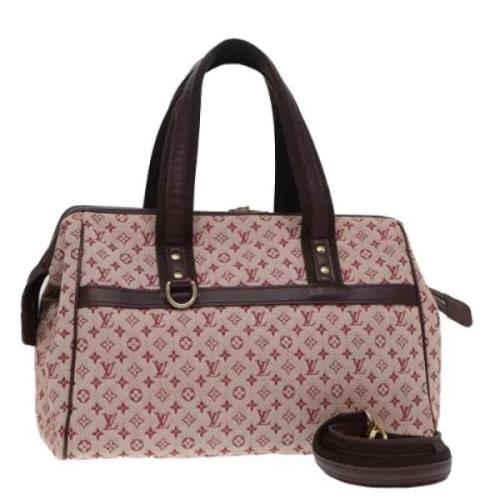 Pre-owned Canvas handbags Louis Vuitton Vintage , Red , Dames