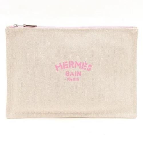 Pre-owned Canvas clutches Hermès Vintage , Beige , Dames