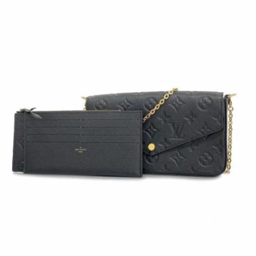 Pre-owned Fabric wallets Louis Vuitton Vintage , Black , Dames