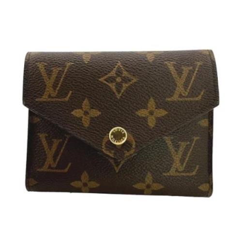 Pre-owned Fabric wallets Louis Vuitton Vintage , Brown , Dames