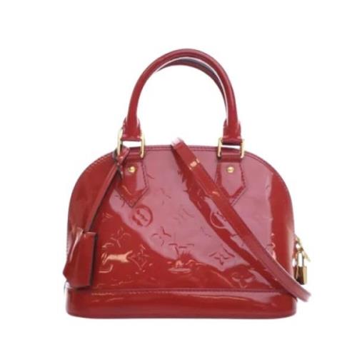 Pre-owned Leather handbags Louis Vuitton Vintage , Red , Dames